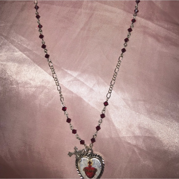 Jewelry - Flaming heart necklace with a cross charm